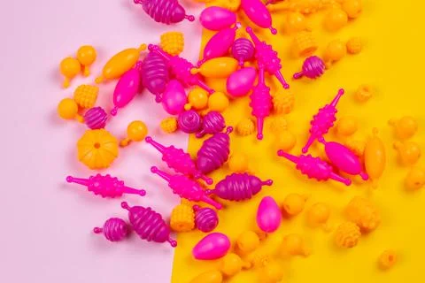 Close-up view of Multicolored plastic beads for a girl's bracelet from a set Stock Photos