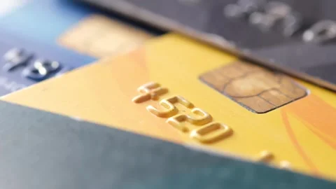 Close up view of multiple credit cards stacked together, financial planning.. Stock Footage 332627057
