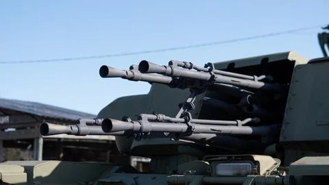 Close View Of Multiple Gun Barrels And Targeting Systems. Multiple Stockfoto's