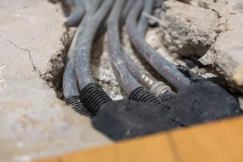 Close up view of multiple heating pipes extended from floor 写真素材