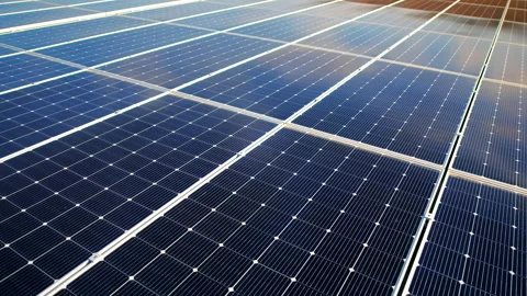 Close view of multiple solar panels on the roof of a manufacturing building. Stock Footage 237724585
