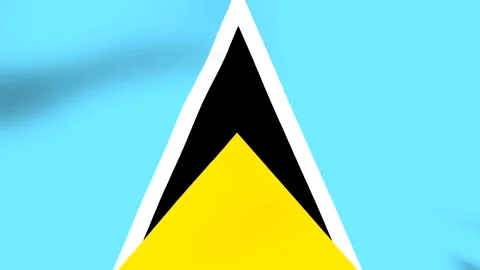 A close up view of the national flag of Saint Lucia waving gently Stock Footage 346545666