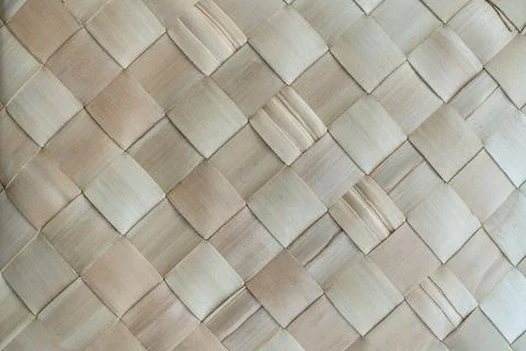 Close up view of natural palm leaf woven texture creating a diagonal geomet.. Stock Photos