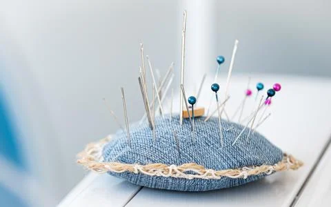 Close up view of needle pillow Stock Photos