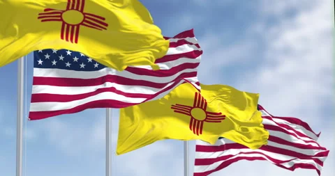 Close-up view of the New Mexico and United States flags waving Stock Footage 324265033
