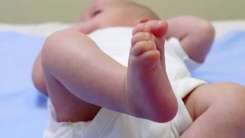 Close Up View of Newborn Baby with Pacifier Lying on Back Vidéo 138116276