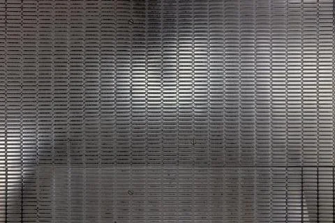 Close-up view of a nonslip textured pattern of stainless steel, metallic floo Stock Photos