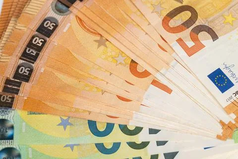 Close view of note stacks highlighting opulence and sophisticated tone. Det.. 스톡 사진