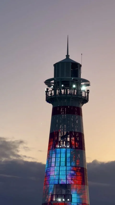 Close view of Ocean Cay's lighthouse at Bahamas' sunset time Stock Footage 330857687