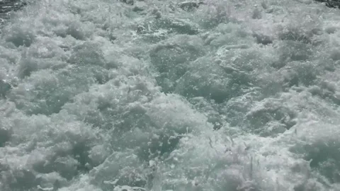 Close-Up View of Ocean Water with Whitecaps and Foam Stock Footage 310324237