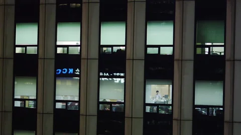 Close-up View of Office Windows at Night Stock Footage 61630629