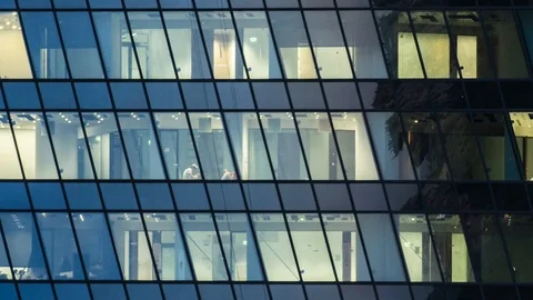 Close up view to office windows in Skyscrapers Moscow-City at night timelapse Stock Footage 95780401