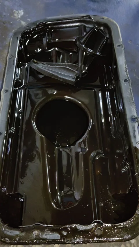 Close-Up View of Oily Control Arm and Ball Joint Components on Car Suspension Stock Footage 346411485