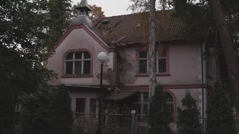 A close-up view of an old abandoned German house from the bottom up Stock Footage 321122835