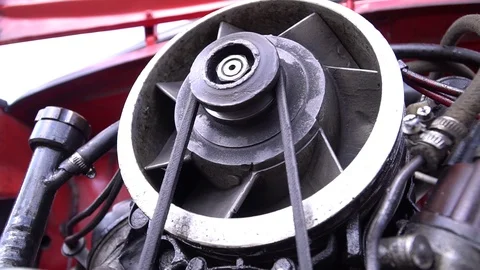 Close view of an old air cooled engine of red car. Stock Footage 125959793