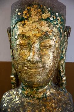 Close view of an old Buddha's face Stock Photos