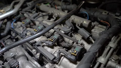 Close up view of old car engine running under artificial lights Stock-Footage 160544700