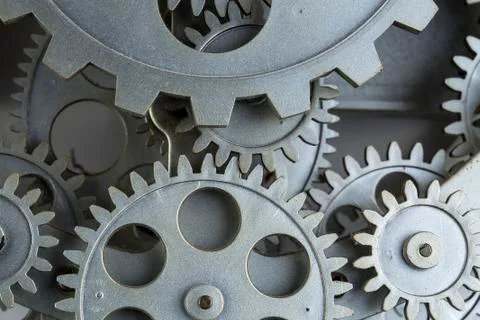 Close view of old clock mechanism with gears and cogs. Conceptual photo for y Stock Photos