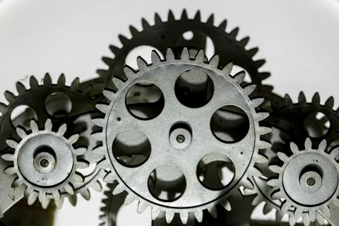Close view of old clock mechanism with gears and cogs. Conceptual photo for y Stock Photos