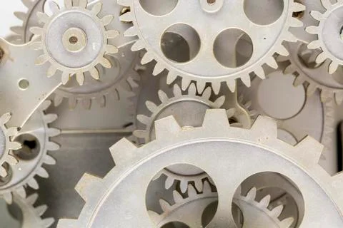 Close view of old clock mechanism with gears and cogs. Conceptual photo for y Stock Photos