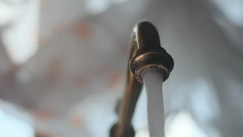Close up view of old copper color faucet or tap in retro kitchen, all covered in Stock-Footage 158131557