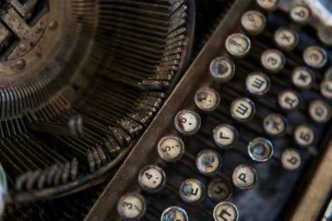 Close up view on an old dirty broken antique typewriter machine keys with Stock Photos