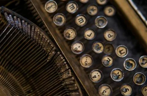 Close up view on an old dirty broken antique typewriter machine keys with Stock Photos
