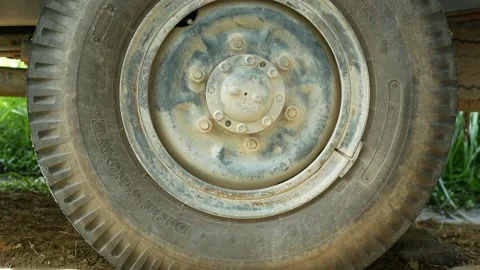 Close-up view of the old dirty wheel of a truck. 動画素材 154251562