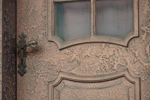 Close-up view of an old door with pattern and glass insert Stock Photos