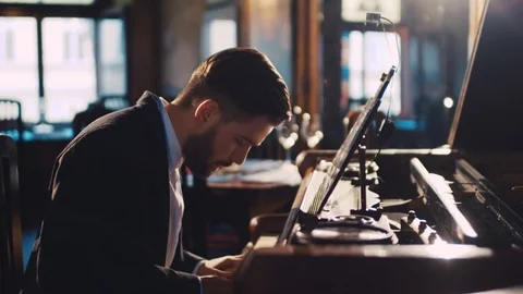 Close up view of an old-fashioned bearded pianist playing the fortepiano  Stock Footage 74625002