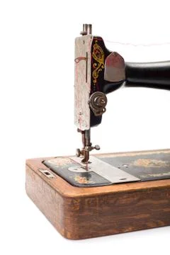 Close view of an old hand driven sewing machine Stock Photos