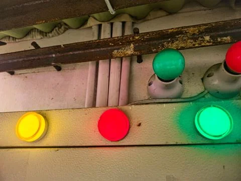 Close up view of old mechanical traffic signal control panel with colored b.. 写真素材