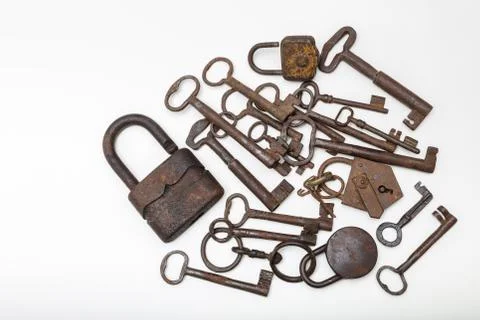 Close up view of old  padlock and keys on a white  background with copy space Stock Photos