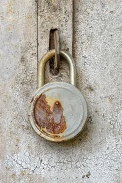 Close View of Old Rusty Padlock on Metal Gate Stock Photos