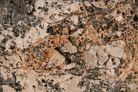 Close-up view of old stone surface with beautiful erosion textures and patterns Foto stock