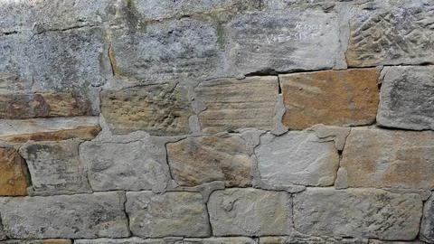 Close-up View of an Old Stone Wall With Varying Textures and Colors Stock Photos