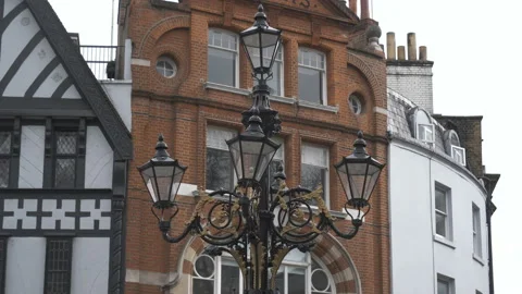 A close up view of an old-style metal street lamp. Stock Footage 152400941
