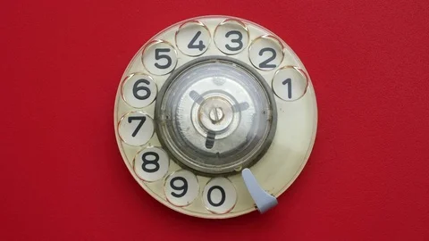 Close-up view on old telephone dial. Dialing 911. Stock Footage 80491928
