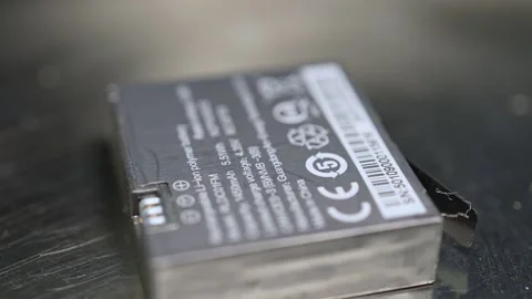 Close-up view of old used battery, with selective focus. Battery for recycl.. Video stock 270191485