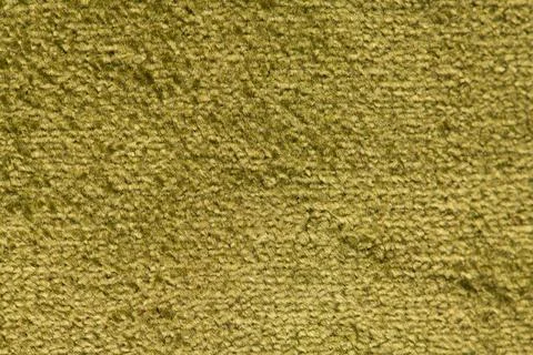 Close-up view of olive green textured carpet surface with a looped boucle p.. Stock Photos