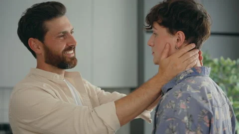 Close up view of the one lgbt partner holding the head of another partner and Stock Footage 213492648