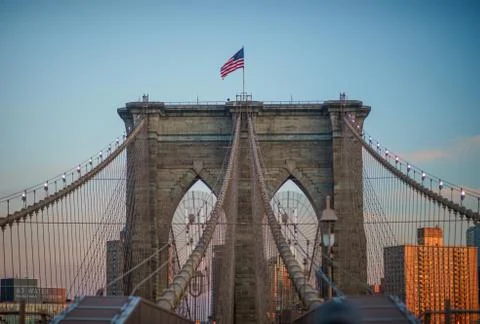 Close up view of one of the towers structures of the brooklyn bridge, flying the Stock Photos