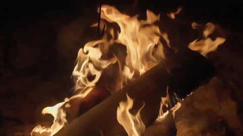 Close up view of open fire with firewood. Romantic calm evening. Stock Footage 141982984