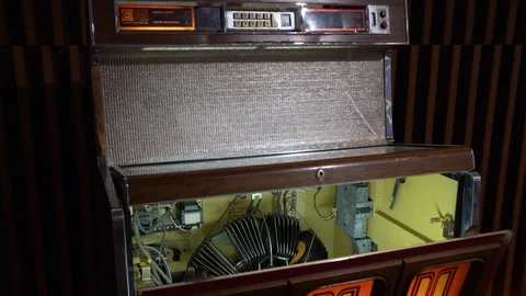 Close view of an opened vintage jukebox from the 70s. Stock Footage 99444929