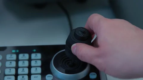 A close view of operating a knob on a electronic device during live Stock Footage 335561026