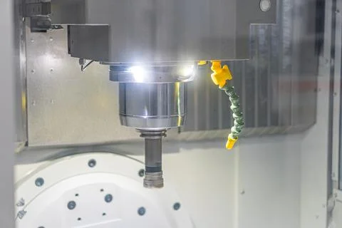 Close-up view of an operating machine tool in industrial setting, with a meta Stock Photos