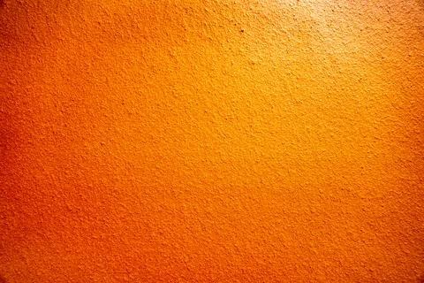 Close Up View of an Orange Textured Wall Stock Photos