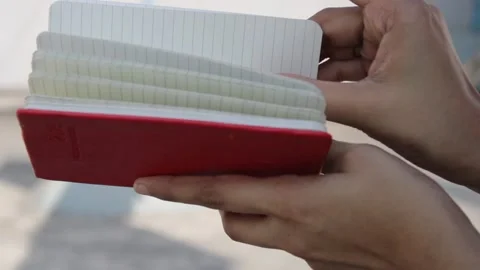 Close view of pages of a notebook turning over 스톡 동영상 132522246