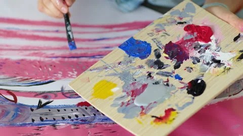 Close up view on painter mixing colours at palette and paint. Art concept. Stock Footage 151862287