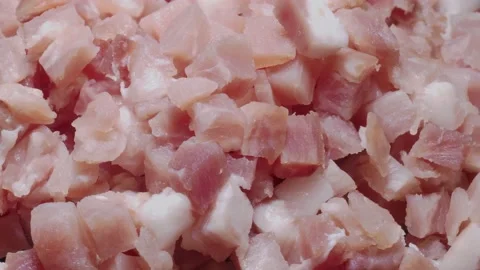 Close-up view of pancetta or ham cubes, 스톡 동영상 142639530